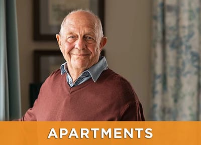 Smiling senior man in a cozy indoor setting