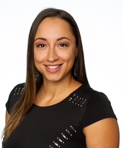 Professional headshot of a smiling woman