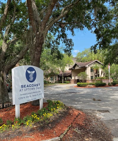 Building exterior of Seacoast at Uptown Oaks with landscaping