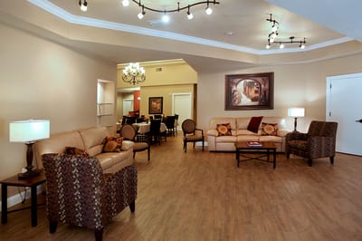 Bright common area with seating and artwork