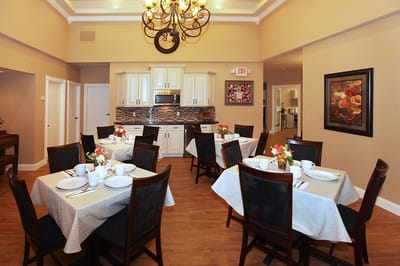 Dining area with tables set for a meal