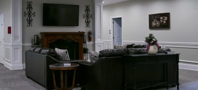 Interior view of a cozy common area with couches