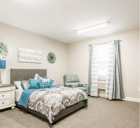 Cozy interior of a resident's bedroom with decor