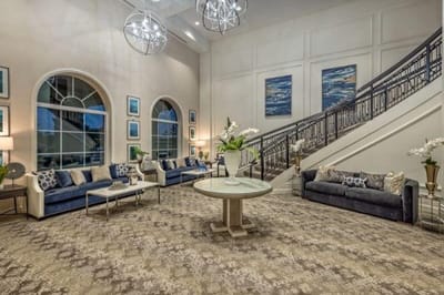 Bright, spacious lobby area with seating and decor
