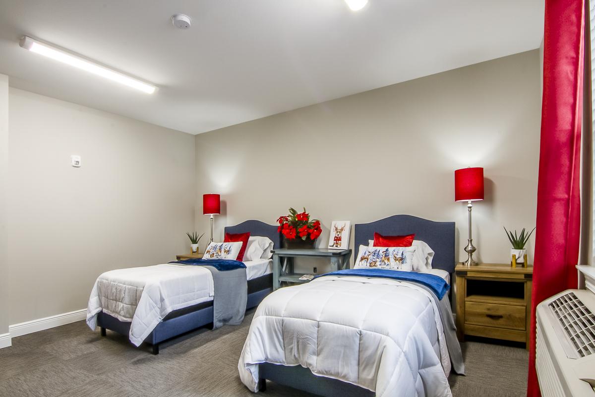 Bright twin bedroom with floral decor