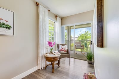 A cozy sitting area with a view of the outdoors