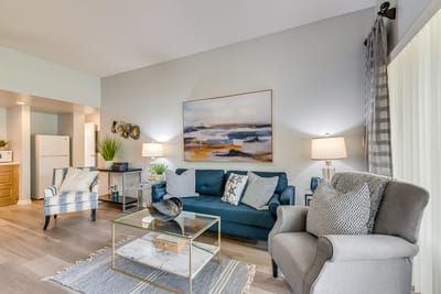 A cozy common area with seating and decor