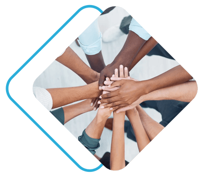 Serenity Spring Senior Living at Scandia Village, nursing home in Sister Bay, WI — Diverse hands joining together in a collaborative gesture