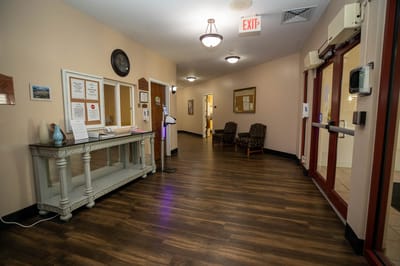 Interior hallway with seating and reception area
