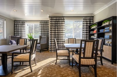 Bright common area with tables and chairs