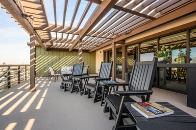 Outdoor seating area with shaded loungers