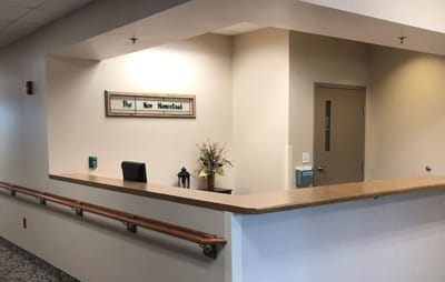 Reception area with name plaque at The New Homestead