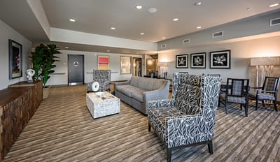 Bright common area with comfortable seating and decor