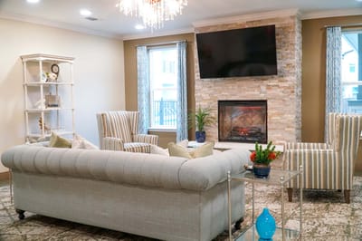 Comfortable interior seating area with a fireplace