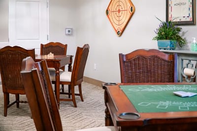 Interior activity room with game tables and decor