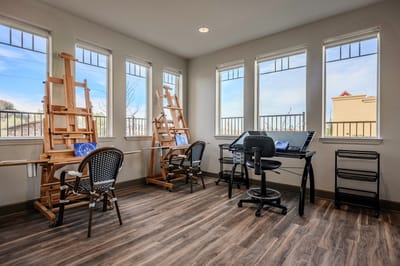 Art room with easels and natural light