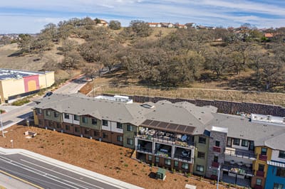Aerial view of the facility exterior with surrounding landscape