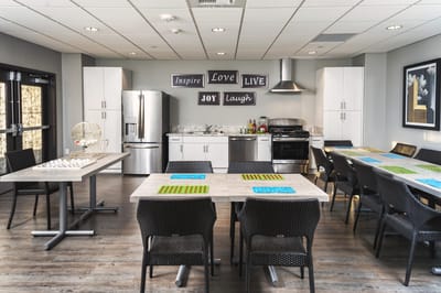 Modern dining room with inspirational signs and kitchen facilities