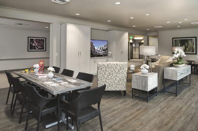 Interior common area with seating and game table