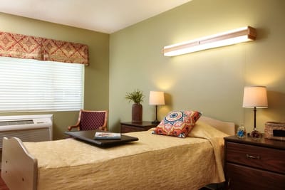 Cozy resident room with a warm color scheme