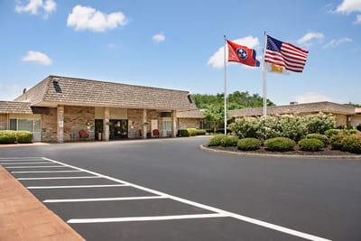 Exterior view of Life Care Center of Morristown with flags