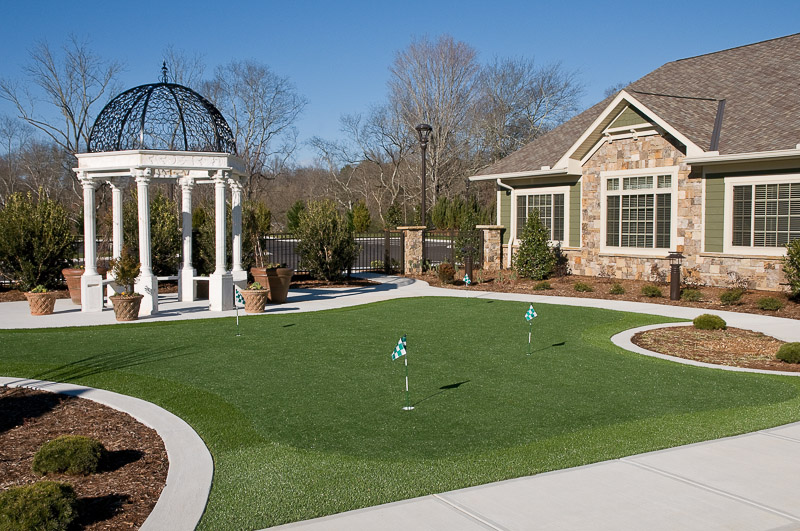 Exterior view of a landscaped outdoor area with a gazebo
