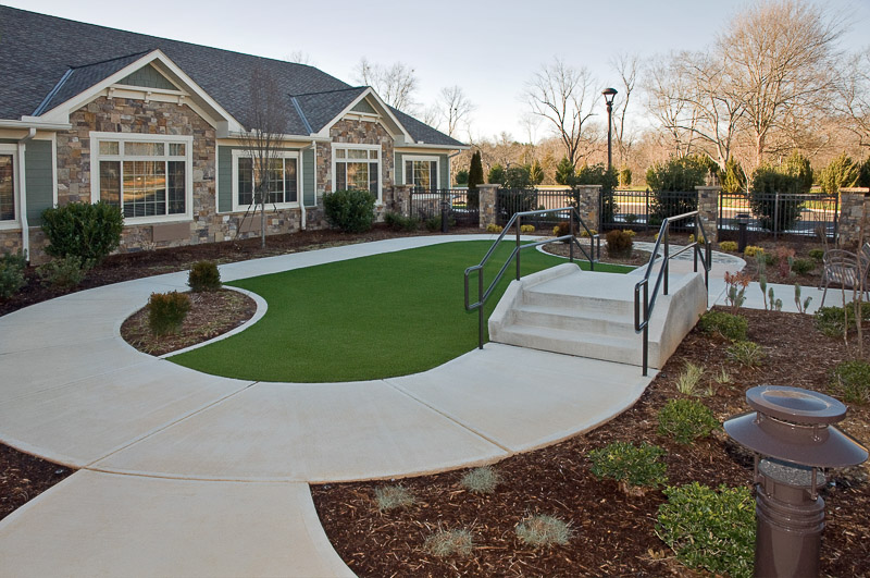 Outdoor space with a pathway and seating area