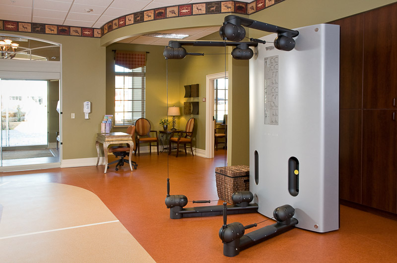 Fitness equipment in a spacious activity room