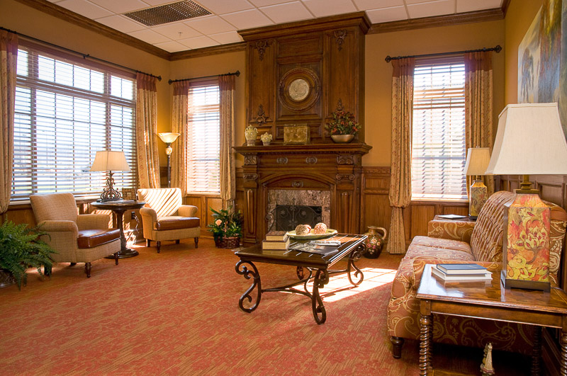 Well-furnished common area with seating and decor