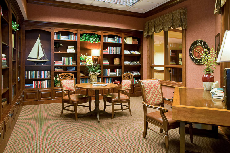 Cozy reading area with bookshelves and seating
