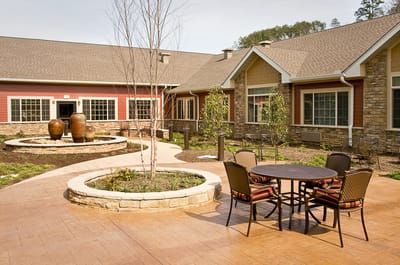 Outdoor courtyard with seating and landscaping