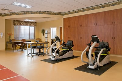 Interior view of a fitness room with exercise equipment