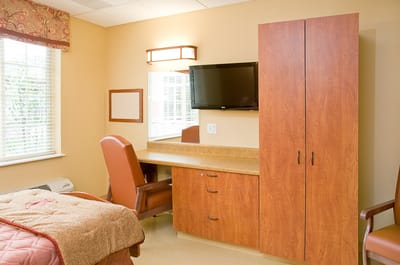Interior view of a resident's room with furniture