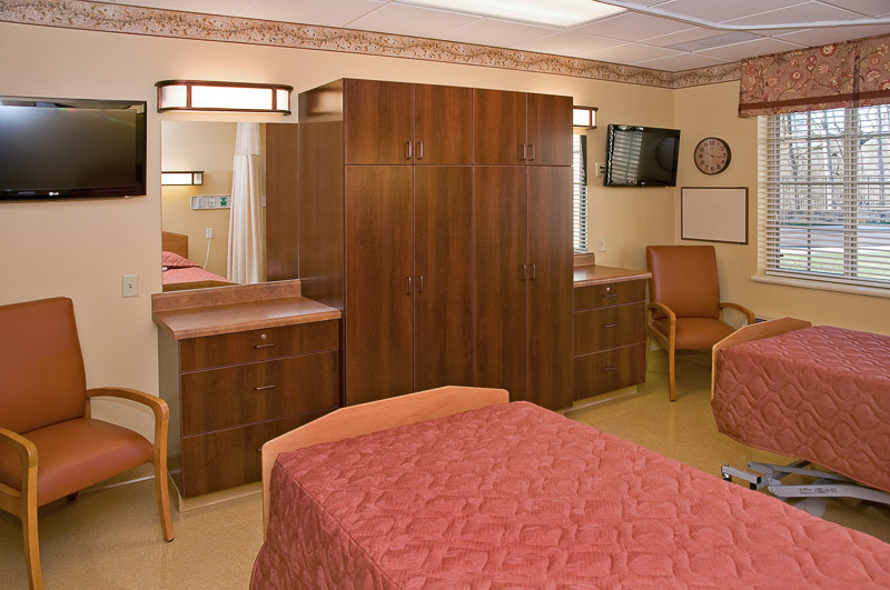 Interior view of a resident's room with two beds