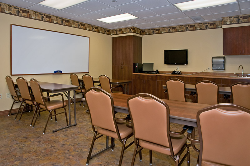 Interior of a common area with tables and chairs