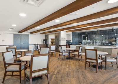 Bright dining area with tables and chairs