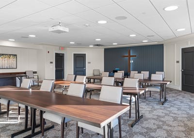 Bright common area with tables and chairs