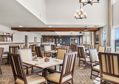 Bright dining room with tables and chairs