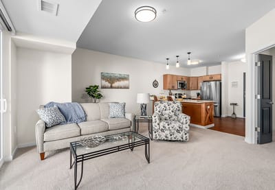 Bright, inviting living room in an assisted living apartment