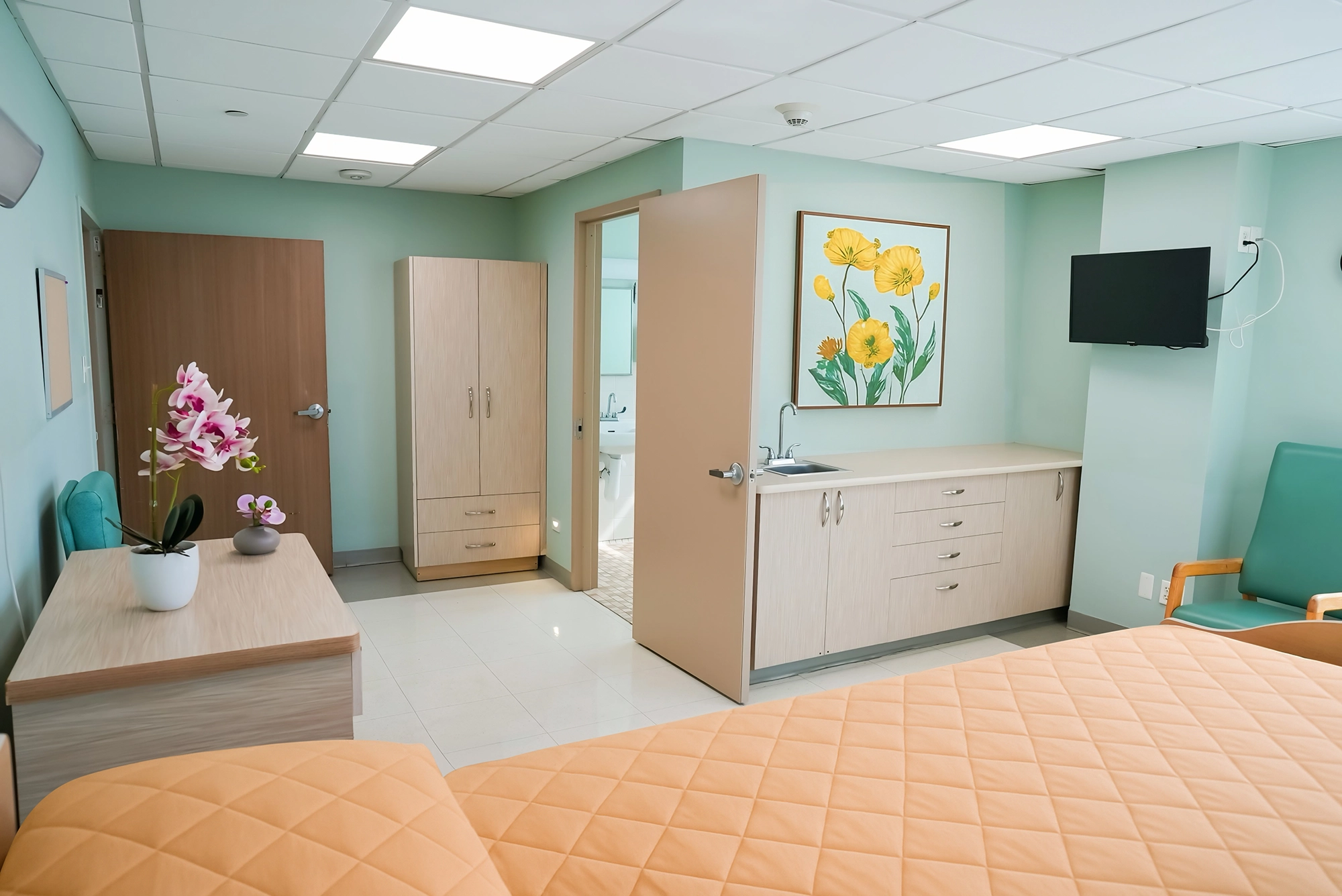 Bright and welcoming resident room with floral decor