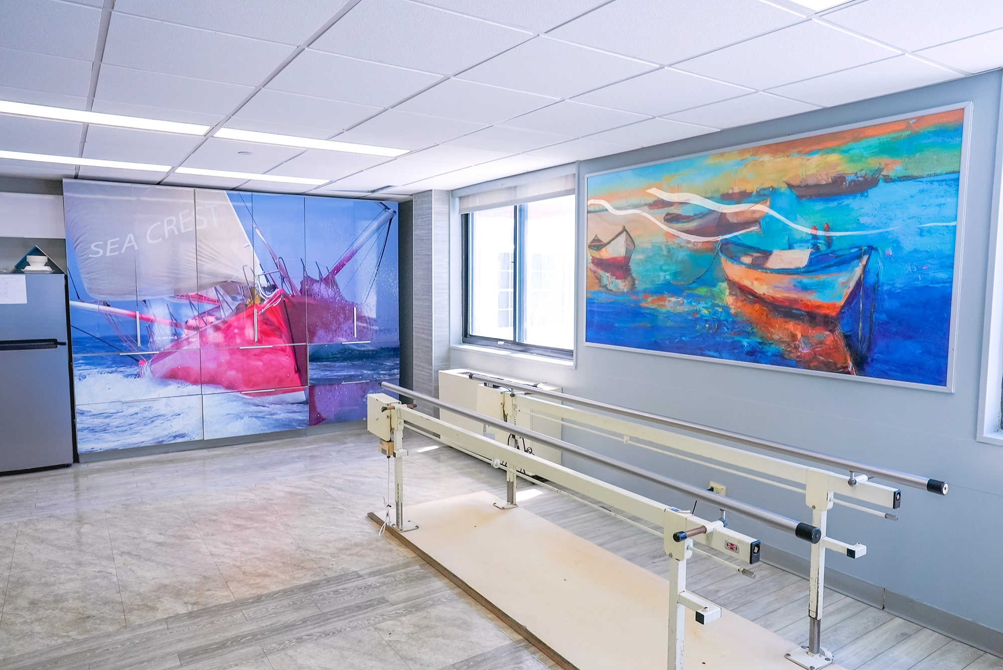 Rehabilitation room with artwork and walking bars