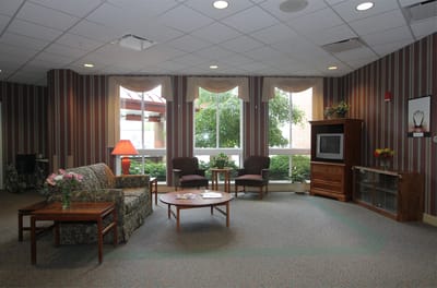 A cozy common area with seating and decor