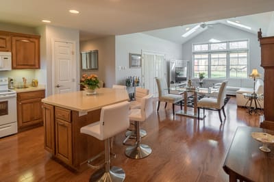 Spacious common area with seating and dining space