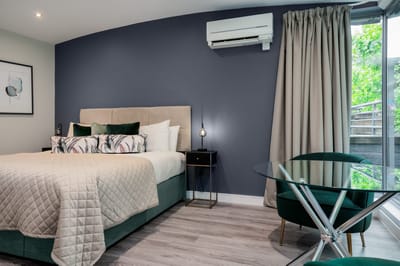 Stylish furnished resident room with modern decor