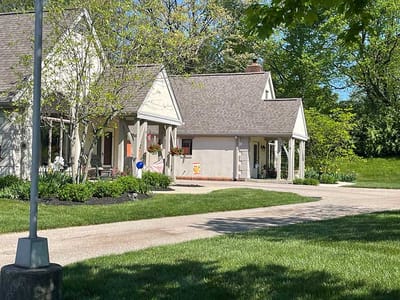 Exterior view of the facility with landscaped garden