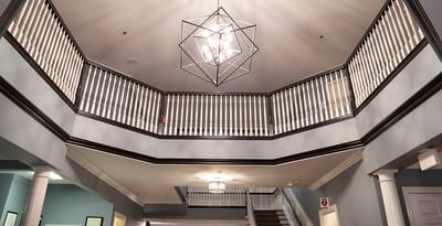 Interior view of a facility space with a chandelier