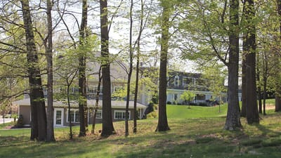 View of the facility surrounded by trees
