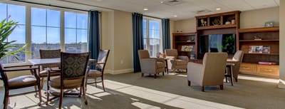 Bright common area with seating and natural light