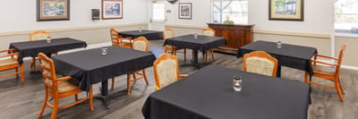 Dining area with empty tables and chairs