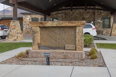 Facility entrance sign outside Stonehenge of Ogden